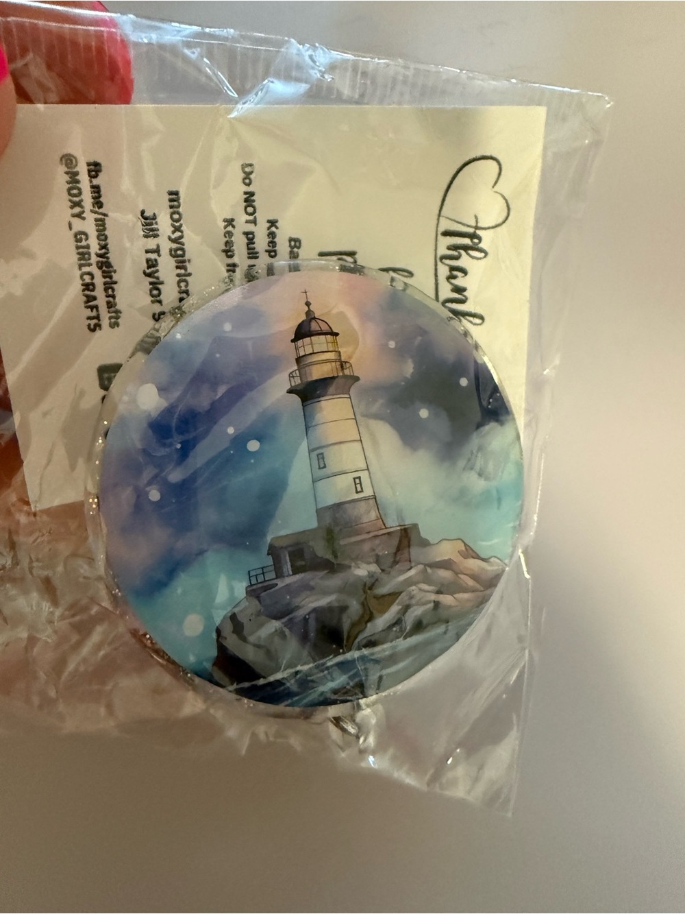 Lighthouse badge reel